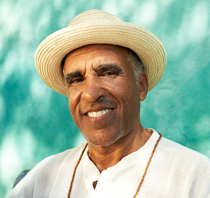 Older man in a hat with dentures in Long Beach, NY