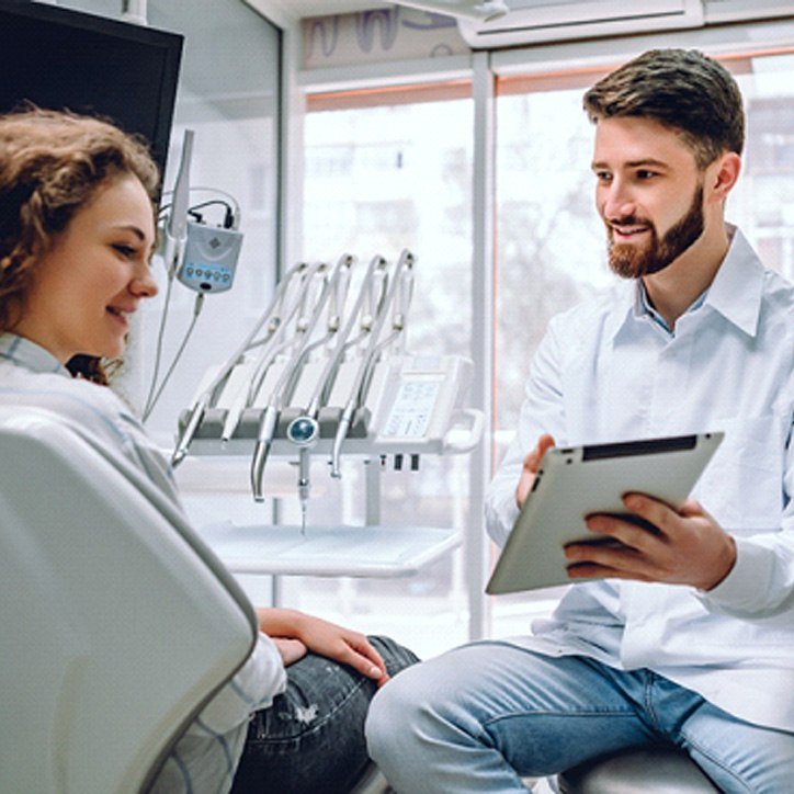 Woman at dentist for teeth whitening in Long Beach
